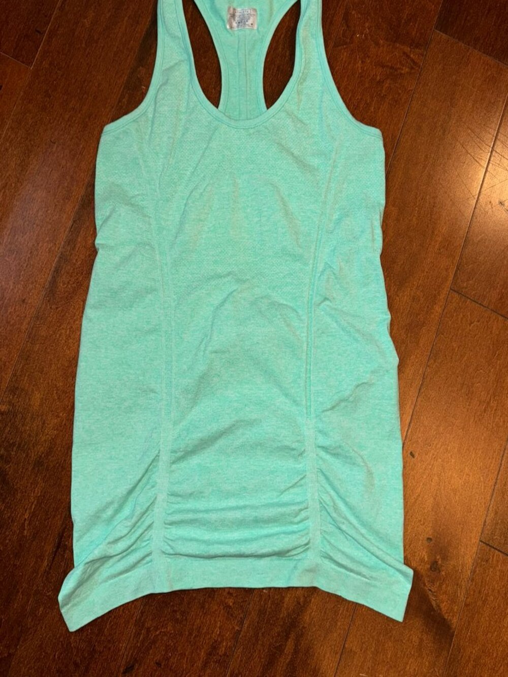 Athleta's Speedlight Tank in Medium - lime color.